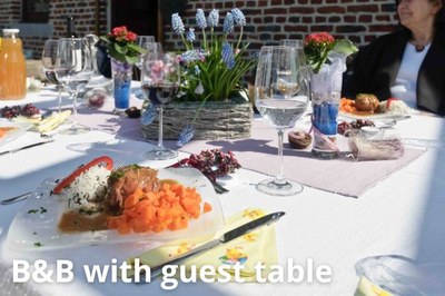 bed and breakfast with guest table in Belgium.jpg